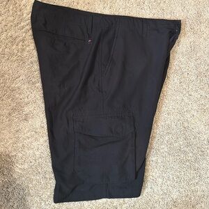 Cargo type shorts 36W. Knee length typical. 100% polyester lightweight. Black.